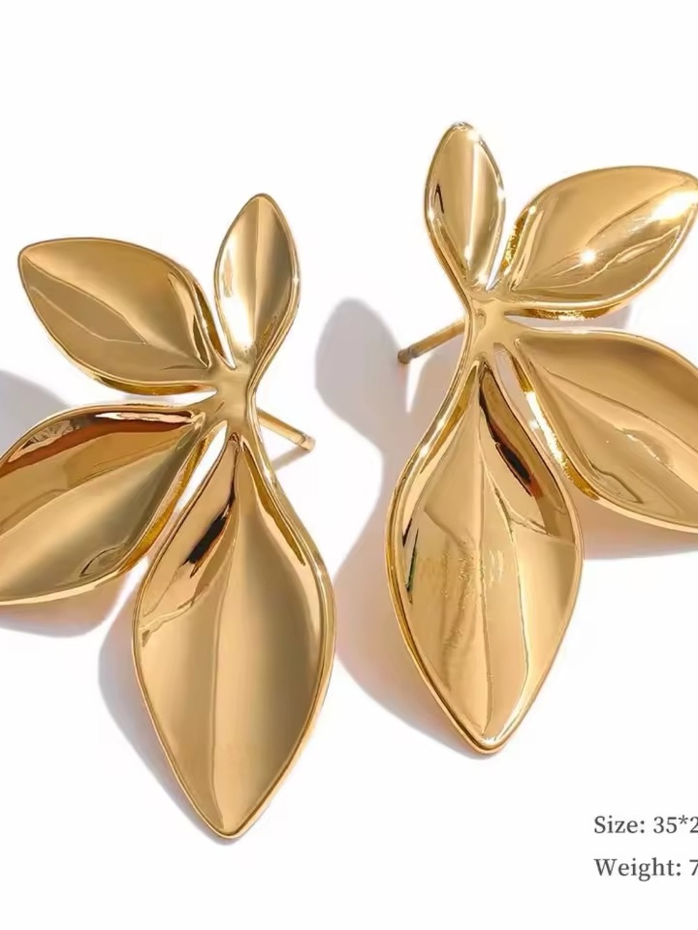 Stainless steel leaves in gold tone stud earrings - Picture 4 of 8